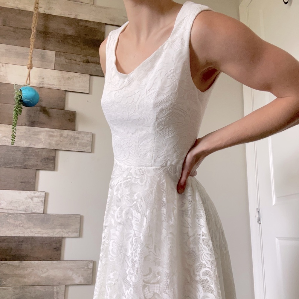 White dress used for sorority lace floral